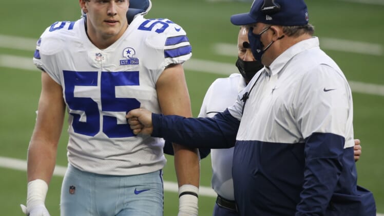 Dec 20, 2020; Arlington, Texas, USA; Dallas Cowboys outside linebacker Leighton Vander Esch (55) leaves the field as he talks to head coach Mike McCarthy in the third quarter against the San Francisco 49ers at AT&T Stadium. Mandatory Credit: Tim Heitman-USA TODAY Sports