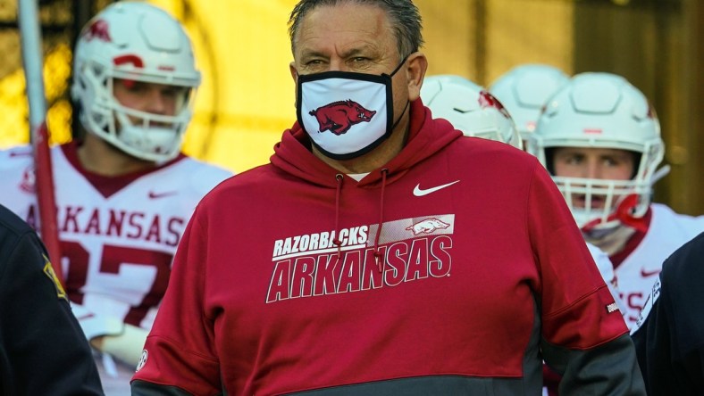 Dec 5, 2020; Columbia, Missouri, USA; Arkansas Razorbacks head coach Sam Pittman leads the team onto the field before the game against the Missouri Tigers at Faurot Field at Memorial Stadium. Mandatory Credit: Jay Biggerstaff-USA TODAY Sports