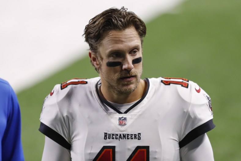 Dec 26, 2020; Detroit, Michigan, USA; Tampa Bay Buccaneers quarterback Blaine Gabbert (11) walks off the field after the game against the Detroit Lions at Ford Field. Mandatory Credit: Raj Mehta-USA TODAY Sports