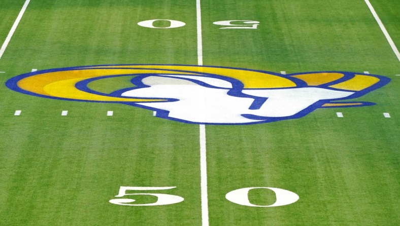 Jan 3, 2021; Inglewood, California, USA; A detailed view of a Los Angeles Rams logo at the 50-yard line before a game against the Arizona Cardinals at SoFi Stadium. Mandatory Credit: Kirby Lee-USA TODAY Sports