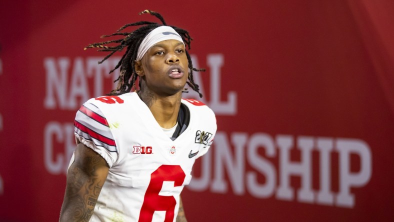 Jan 11, 2021; Miami Gardens, Florida, USA; Ohio State Buckeyes wide receiver Jameson Williams (6) against the Alabama Crimson Tide in the 2021 CFP National Championship Game. Mandatory Credit: Mark J. Rebilas-USA TODAY Sports