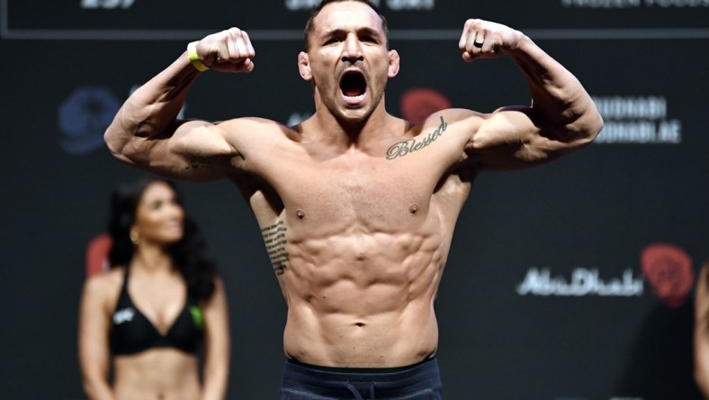 Jan 22, 2021; Abu Dhabi, UNITED ARAB EMIRATES;  Michael Chandler poses on the scale during the UFC 257 weigh-in at Etihad Arena on UFC Fight Island on January 22, 2021 in Abu Dhabi, United Arab Emirates.   Mandatory Credit: Jeff Bottari/Handout Photo via USA TODAY Sports