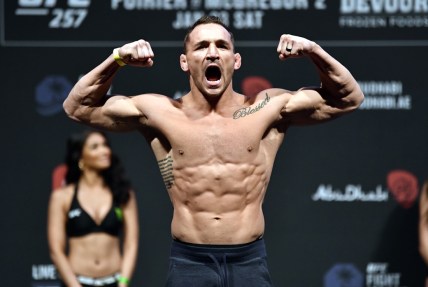 Jan 22, 2021; Abu Dhabi, UNITED ARAB EMIRATES;  Michael Chandler poses on the scale during the UFC 257 weigh-in at Etihad Arena on UFC Fight Island on January 22, 2021 in Abu Dhabi, United Arab Emirates.   Mandatory Credit: Jeff Bottari/Handout Photo via USA TODAY Sports