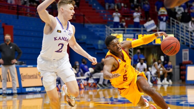 Feb 11, 2021; Lawrence, Kansas, USA; Iowa State Cyclones guard Jalen Coleman-Lands (5) looses the ball as Kansas Jayhawks guard Christian Braun (2) defends during the second half at Allen Fieldhouse. Mandatory Credit: Denny Medley-USA TODAY Sports
