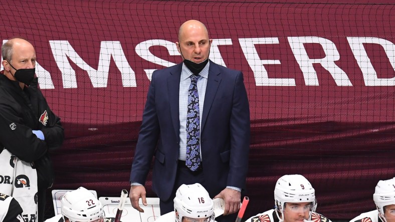 Mar 8, 2021; Denver, Colorado, USA; Arizona Coyotes head coach Rick Tocchet during the first period against the Colorado Avalanche at Ball Arena. Mandatory Credit: Ron Chenoy-USA TODAY Sports