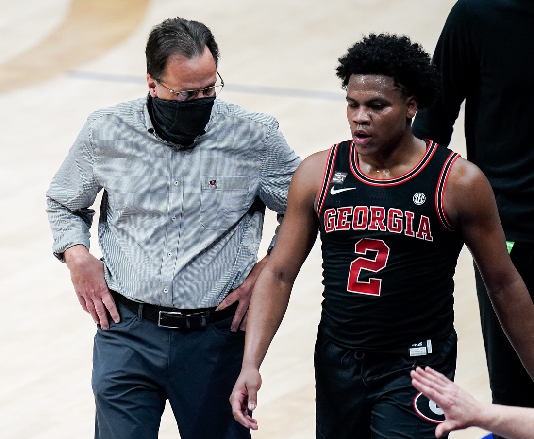 Georgia head coach Tom Crean works with guard Sahvir Wheeler (2) during the first half of the SEC Men's Basketball Tournament game against Missouri at Bridgestone Arena in Nashville, Tenn., Thursday, March 11, 2021.

Mo Ga Sec 031121 An 013