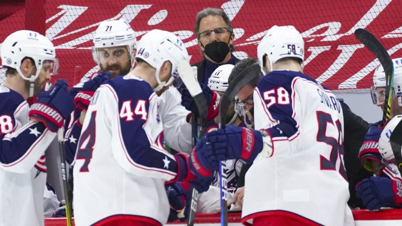 Mar 20, 2021; Raleigh, North Carolina, USA;  Columbus Blue Jackets head coach John Tortorella looks on during a timeout against the Carolina Hurricanes at PNC Arena. Mandatory Credit: James Guillory-USA TODAY Sports