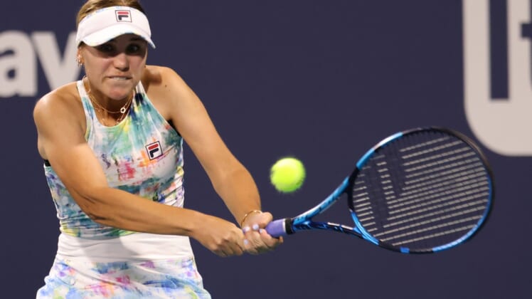 Mar 26, 2021; Miami, Florida, USA; Sofia Kenin of the United States hits a backhand against Andrea Petkovic of Germany (not pictured) in the second round in the Miami Open at Hard Rock Stadium. Mandatory Credit: Geoff Burke-USA TODAY Sports