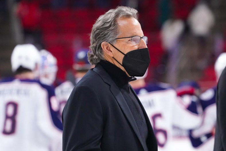Mar 18, 2021; Raleigh, North Carolina, USA;  Columbus Blue Jackets head coach John Tortorella walks off the ice after the game against the Carolina Hurricanes at PNC Arena. Mandatory Credit: James Guillory-USA TODAY Sports
