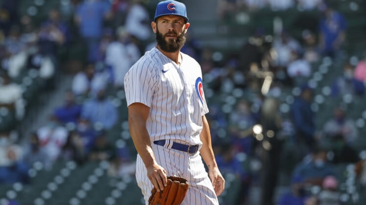 Apr 3, 2021; Chicago, Illinois, USA; Chicago Cubs starting pitcher Jake Arrieta (49) walks to dugout after delivering against the Pittsburgh Pirates in the fifth inning at Wrigley Field. Mandatory Credit: Kamil Krzaczynski-USA TODAY Sports