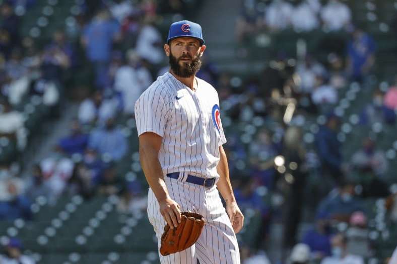 Apr 3, 2021; Chicago, Illinois, USA; Chicago Cubs starting pitcher Jake Arrieta (49) walks to dugout after delivering against the Pittsburgh Pirates in the fifth inning at Wrigley Field. Mandatory Credit: Kamil Krzaczynski-USA TODAY Sports