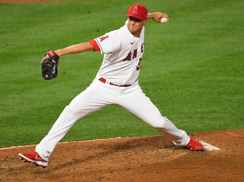 Apr 3, 2021; Anaheim, California, USA; Los Angeles Angels relief Tony Watson (35) throws against the Chicago White Sox in the sixth inning at Angel Stadium. Mandatory Credit: Jayne Kamin-Oncea-USA TODAY Sports