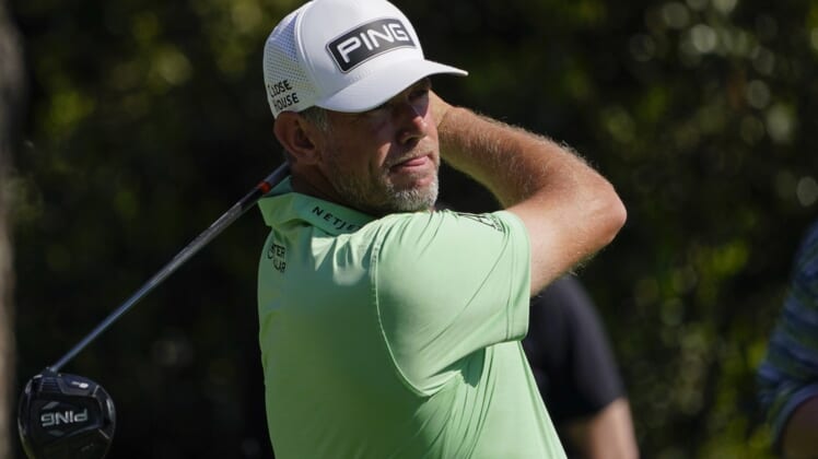 Apr 5, 2021; Augusta, Georgia, USA; Lee Westwood hits his tee shot on the 15th hole during a practice round for The Masters golf tournament at Augusta National Golf Club. Mandatory Credit: Michael Madrid-USA TODAY Sports