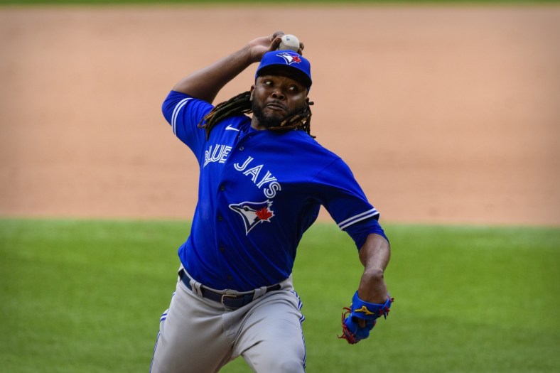 Apr 5, 2021; Arlington, Texas, USA; Toronto Blue Jays relief pitcher Rafael Dolis (41) pitches against the Texas Rangers during the game at Globe Life Field. Mandatory Credit: Jerome Miron-USA TODAY Sports