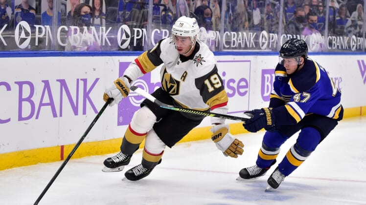 Apr 7, 2021; St. Louis, Missouri, USA;  Vegas Golden Knights right wing Reilly Smith (19) handles the puck as St. Louis Blues defenseman Torey Krug (47) defends during the third period at Enterprise Center. Mandatory Credit: Jeff Curry-USA TODAY Sports