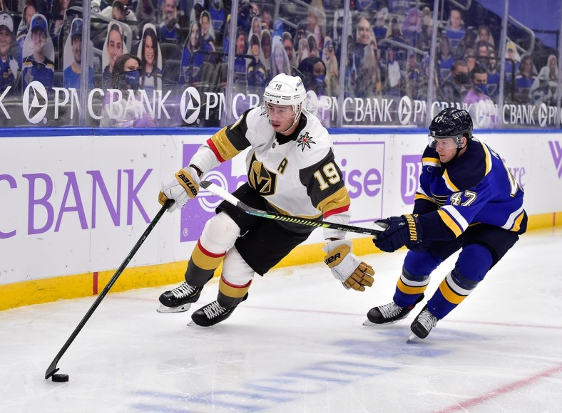 Apr 7, 2021; St. Louis, Missouri, USA;  Vegas Golden Knights right wing Reilly Smith (19) handles the puck as St. Louis Blues defenseman Torey Krug (47) defends during the third period at Enterprise Center. Mandatory Credit: Jeff Curry-USA TODAY Sports