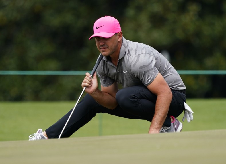 Apr 8, 2021; Augusta, Georgia, USA; Brooks Koepka on the 17th green during the first round of The Masters golf tournament. Mandatory Credit: Michael Madrid-USA TODAY Sports