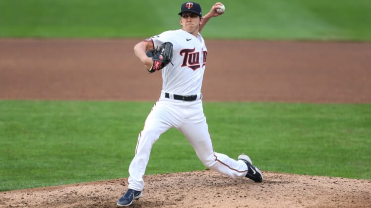 Apr 8, 2021; Minneapolis, Minnesota, USA; Minnesota Twins relief pitcher Brandon Waddell (58) delivers a pitch in the ninth inning against the Seattle Mariners at Target Field. Mandatory Credit: David Berding-USA TODAY Sports