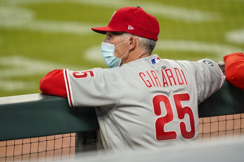 Apr 9, 2021; Cumberland, Georgia, USA; Philadelphia Phillies manager Joe Girardi (25) shown in the dugout against the Atlanta Braves during the seventh inning at Truist Park. Mandatory Credit: Dale Zanine-USA TODAY Sports