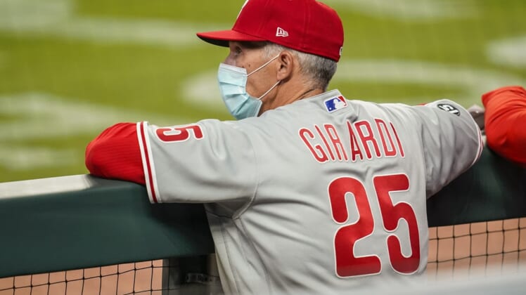 Apr 9, 2021; Cumberland, Georgia, USA; Philadelphia Phillies manager Joe Girardi (25) shown in the dugout against the Atlanta Braves during the seventh inning at Truist Park. Mandatory Credit: Dale Zanine-USA TODAY Sports