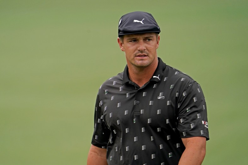 Apr 10, 2021; Augusta, Georgia, USA; Bryson DeChambeau walks on the second hole during the third round of The Masters golf tournament. Mandatory Credit: Rob Schumacher-USA TODAY Sports