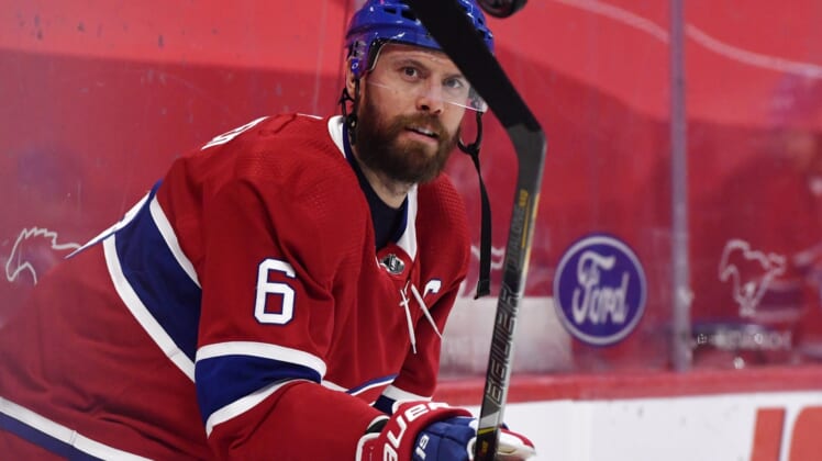 Apr 14, 2021; Montreal, Quebec, CAN; Montreal Canadiens defenseman Shea Weber (6) juggles a puck during the warmup period before the game against the Calgary Flames at the Bell Centre. Mandatory Credit: Eric Bolte-USA TODAY Sports