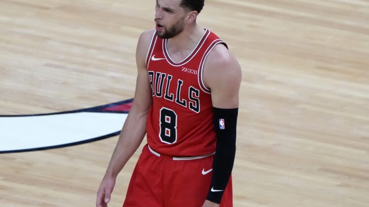 Apr 14, 2021; Chicago, Illinois, USA; Chicago Bulls guard Zach LaVine (8) reacts after a foul call during the second quarter against the Orlando Magic at the United Center. Mandatory Credit: Mike Dinovo-USA TODAY Sports