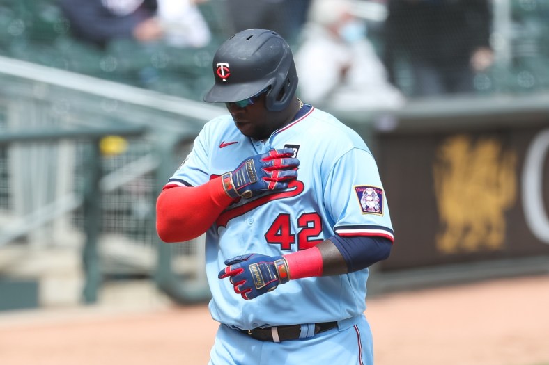 Apr 15, 2021; Minneapolis, Minnesota, USA; Minnesota Twins first baseman Miguel Sano celebrates after hitting a solo home run against the Boston Red Sox in the sixth inning at Target Field. Mandatory Credit: David Berding-USA TODAY Sports