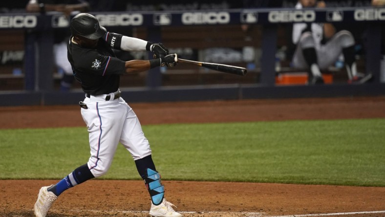 Apr 16, 2021; Miami, Florida, USA; Miami Marlins center fielder Starling Marte connects for a three-run homerun in the 8th inning San Francisco Giants at loanDepot park. Mandatory Credit: Jasen Vinlove-USA TODAY Sports