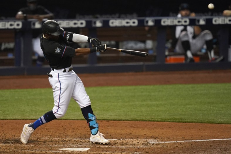 Apr 16, 2021; Miami, Florida, USA; Miami Marlins center fielder Starling Marte connects for a three-run homerun in the 8th inning San Francisco Giants at loanDepot park. Mandatory Credit: Jasen Vinlove-USA TODAY Sports
