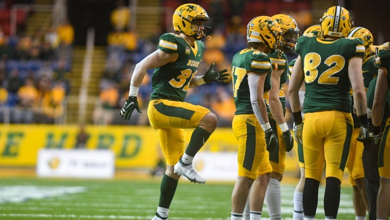 North Dakota State kicker Nathan Whiting warms up his leg during a huddle in the Dakota Marker rivalry game on Saturday, April 17, 2021, at the Fargodome in Fargo.

Dakota Marker 015