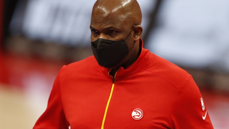 Apr 26, 2021; Detroit, Michigan, USA; Atlanta Hawks head coach Nate McMillan walks to the locker room just after the second quarter against the Detroit Pistons at Little Caesars Arena. Mandatory Credit: Raj Mehta-USA TODAY Sports