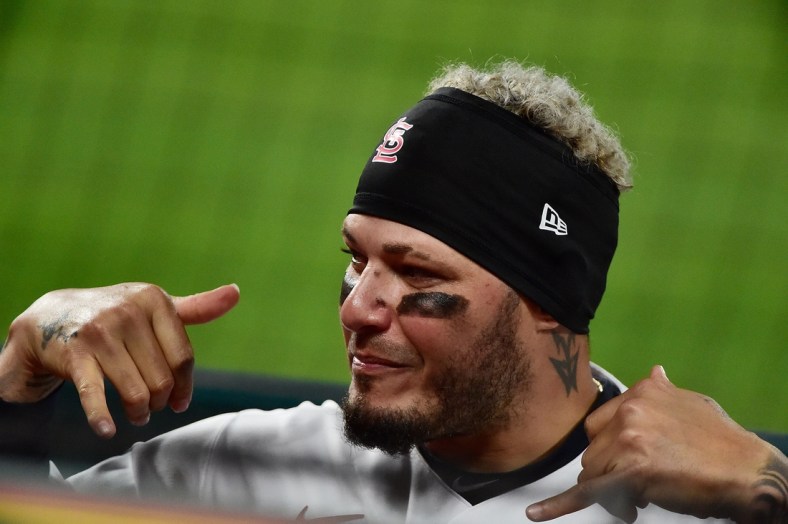 Apr 26, 2021; St. Louis, Missouri, USA;  St. Louis Cardinals catcher Yadier Molina (4) celebrates after the Cardinals scored a run during the ninth inning against Philadelphia Phillies at Busch Stadium. Mandatory Credit: Jeff Curry-USA TODAY Sports