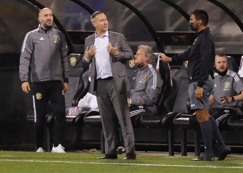 Columbus Crew SC head coach Caleb Porter reacts from the bench in the second half of the first leg of the CONCACAF Champions League quarterfinals against CF Monterrey at Crew Stadium in Columbus on Wednesday, April 28, 2021. The teams tied 2-2.

Columbus Crew Sc Vs Cf Monterrey
