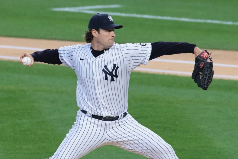 Apr 30, 2021; Bronx, New York, USA; New York Yankees starting pitcher Gerrit Cole (45) delivers a pitch during the first inning against the Detroit Tigers at Yankee Stadium. Mandatory Credit: Vincent Carchietta-USA TODAY Sports