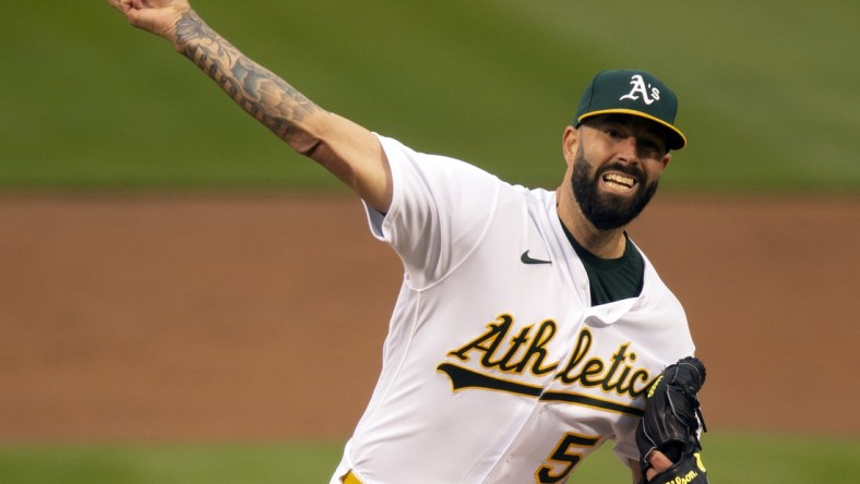 Apr 30, 2021; Oakland, California, USA; Oakland Athletics starting pitcher Mike Fiers (50) delivers a pitch against the Baltimore Orioles during the second inning at RingCentral Coliseum. Mandatory Credit: D. Ross Cameron-USA TODAY Sports