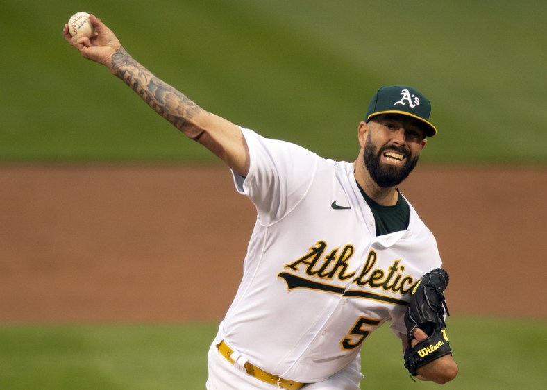 Apr 30, 2021; Oakland, California, USA; Oakland Athletics starting pitcher Mike Fiers (50) delivers a pitch against the Baltimore Orioles during the second inning at RingCentral Coliseum. Mandatory Credit: D. Ross Cameron-USA TODAY Sports