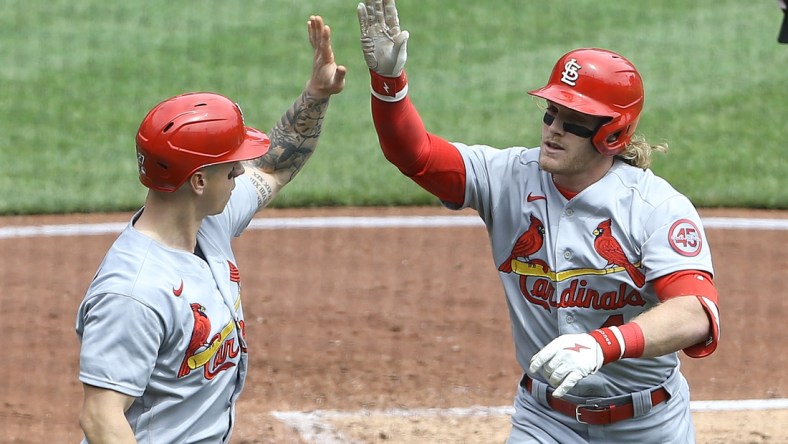 May 2, 2021; Pittsburgh, Pennsylvania, USA;  St. Louis Cardinals left fielder Tyler O'Neill (left) high fives center fielder Harrison Bader (48) after Bader hit a three run home run against the Pittsburgh Pirates during the second inning at PNC Park. Mandatory Credit: Charles LeClaire-USA TODAY Sports