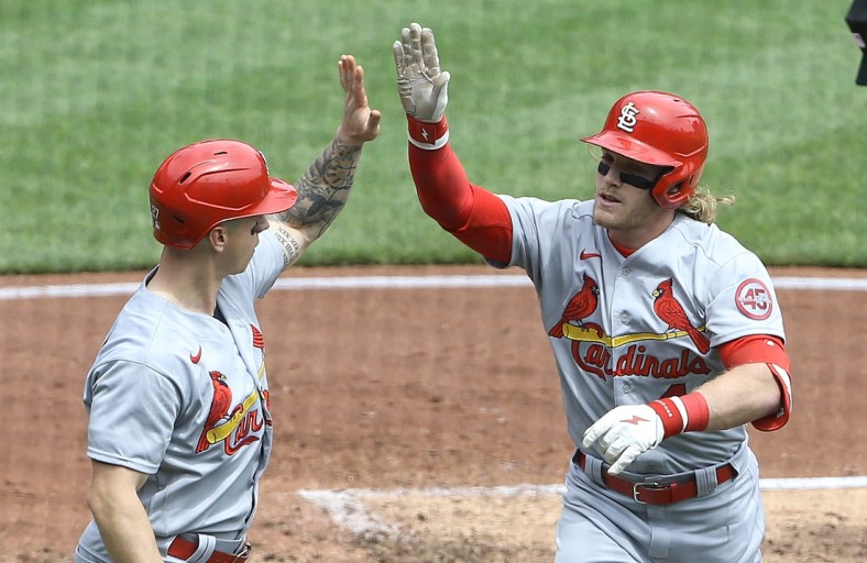 May 2, 2021; Pittsburgh, Pennsylvania, USA;  St. Louis Cardinals left fielder Tyler O'Neill (left) high fives center fielder Harrison Bader (48) after Bader hit a three run home run against the Pittsburgh Pirates during the second inning at PNC Park. Mandatory Credit: Charles LeClaire-USA TODAY Sports