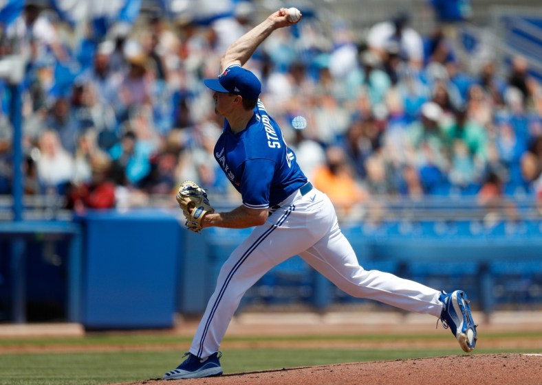 May 2, 2021; Dunedin, Florida, USA; Toronto Blue Jays pitcher Ross Stripling (48) throws a pitch in the first inning against the Atlanta Braves at TD Ballpark. Mandatory Credit: Nathan Ray Seebeck-USA TODAY Sports