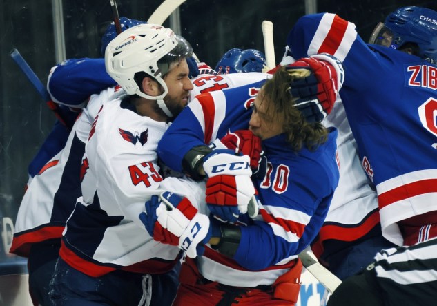 May 3, 2021; New York, New York, USA;   Tom Wilson #43 of the Washington Capitals takes a roughing penalty during the second period against Artemi Panarin #10 of the New York Rangers at Madison Square Garden. Mandatory Credit:  Bruce Bennett/POOL PHOTOS-USA TODAY Sports
