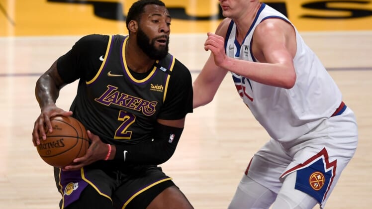 May 3, 2021; Los Angeles, California, USA; Los Angeles Lakers center Andre Drummond (2) is defended by Denver Nuggets center Nikola Jokic (15) in the first quarter of the game at Staples Center. Mandatory Credit: Jayne Kamin-Oncea-USA TODAY Sports