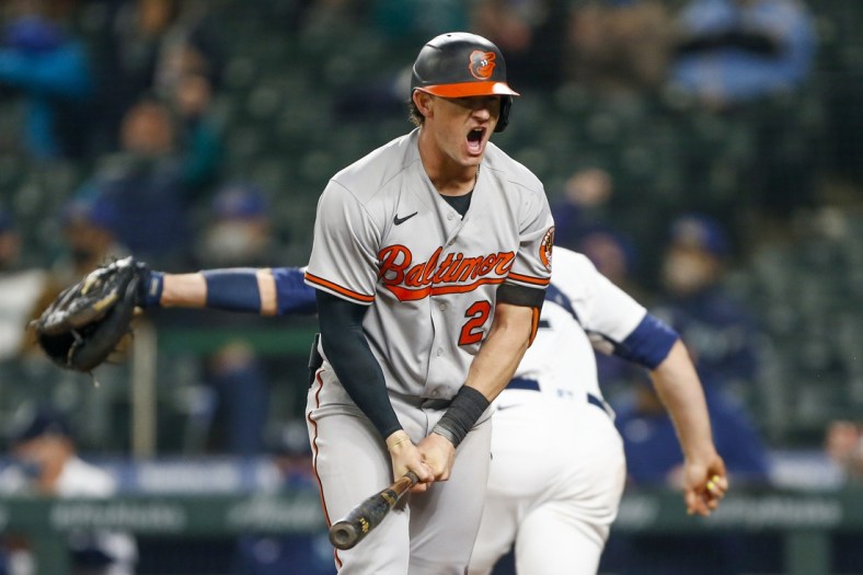 May 3, 2021; Seattle, Washington, USA; Baltimore Orioles right fielder Austin Hays (21) reacts after striking out to end the fifth inning against the Seattle Mariners at T-Mobile Park. Mandatory Credit: Joe Nicholson-USA TODAY Sports
