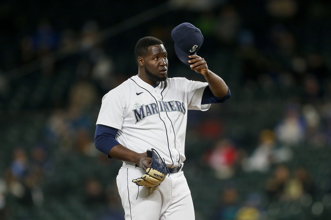 May 3, 2021; Seattle, Washington, USA; Seattle Mariners relief pitcher Domingo Tapia (45) throws against the Baltimore Orioles during the third inning at T-Mobile Park. Mandatory Credit: Joe Nicholson-USA TODAY Sports