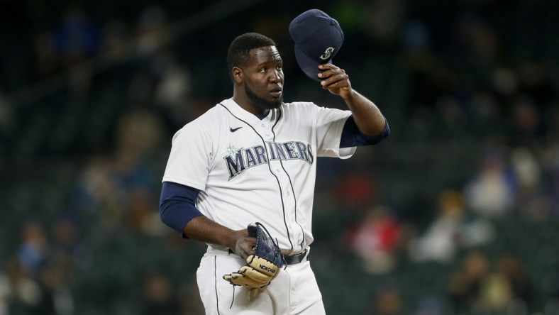 May 3, 2021; Seattle, Washington, USA; Seattle Mariners relief pitcher Domingo Tapia (45) throws against the Baltimore Orioles during the third inning at T-Mobile Park. Mandatory Credit: Joe Nicholson-USA TODAY Sports