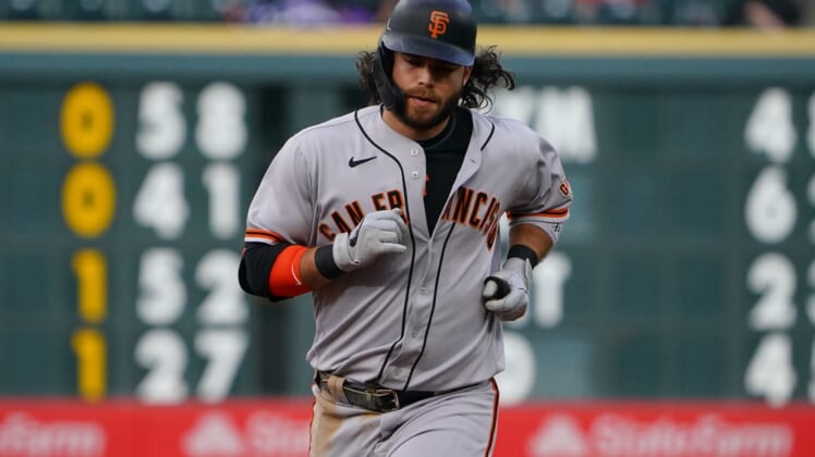 May 4, 2021; Denver, Colorado, USA; San Francisco Giants shortstop Brandon Crawford (35) runs off his two run home run in the sixth inning against the Colorado Rockies at Coors Field. Mandatory Credit: Ron Chenoy-USA TODAY Sports