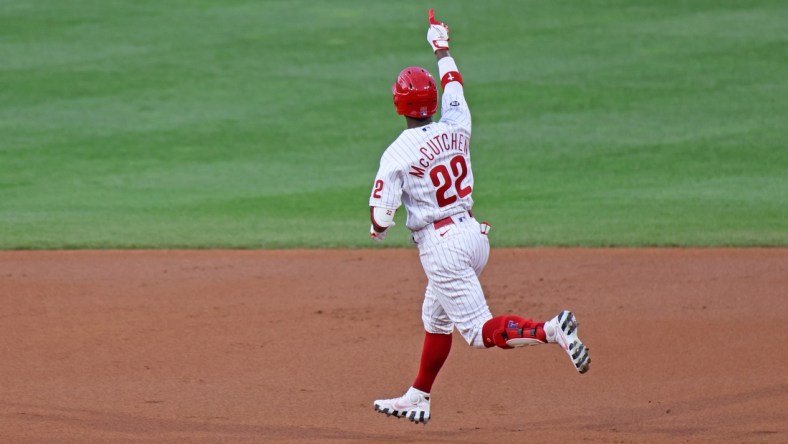 May 4, 2021; Philadelphia, Pennsylvania, USA; Philadelphia Phillies left fielder Andrew McCutchen (22) gestures as he rounds the bases for a home run against the Milwaukee Brewers in the first inning at Citizens Bank Park. Mandatory Credit: Kam Nedd-USA TODAY Sports