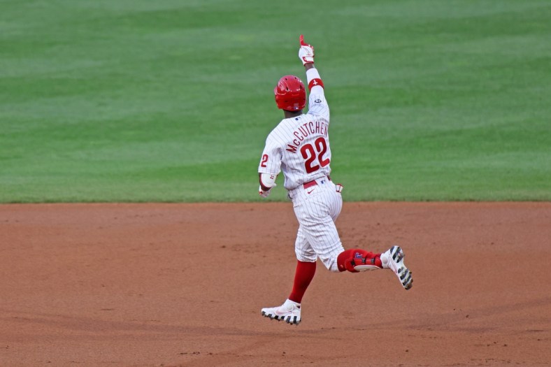 May 4, 2021; Philadelphia, Pennsylvania, USA; Philadelphia Phillies left fielder Andrew McCutchen (22) gestures as he rounds the bases for a home run against the Milwaukee Brewers in the first inning at Citizens Bank Park. Mandatory Credit: Kam Nedd-USA TODAY Sports