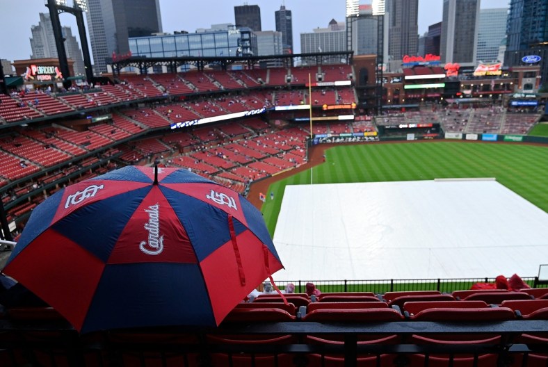 May 4, 2021; St. Louis, Missouri, USA;  Fans sit in the seats as storms move through the area prior to a game between the St. Louis Cardinals and the New York Mets at Busch Stadium. The game was postponed and will be made up May 5, 2021 as a doubleheader. Mandatory Credit: Jeff Curry-USA TODAY Sports