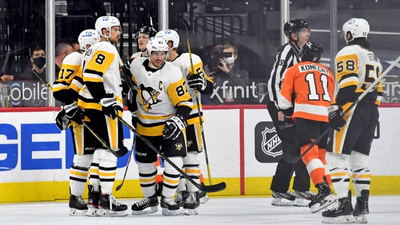 May 4, 2021; Philadelphia, Pennsylvania, USA;  Pittsburgh Penguins center Sidney Crosby (87) celebrates his goal with teammates against the Philadelphia Flyers during the third period at Wells Fargo Center. Mandatory Credit: Eric Hartline-USA TODAY Sports